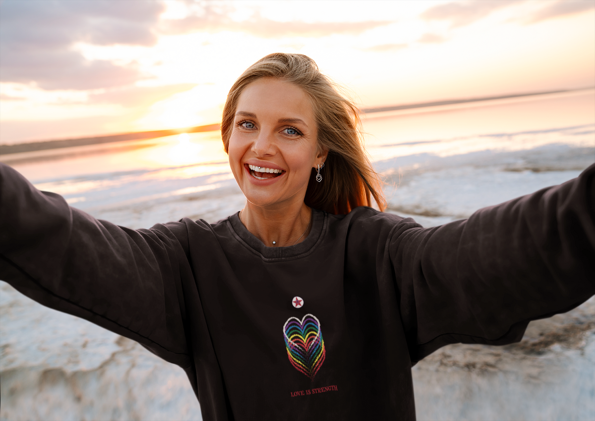 Women's Love Is Strength Unisex Premium Sweatshirt